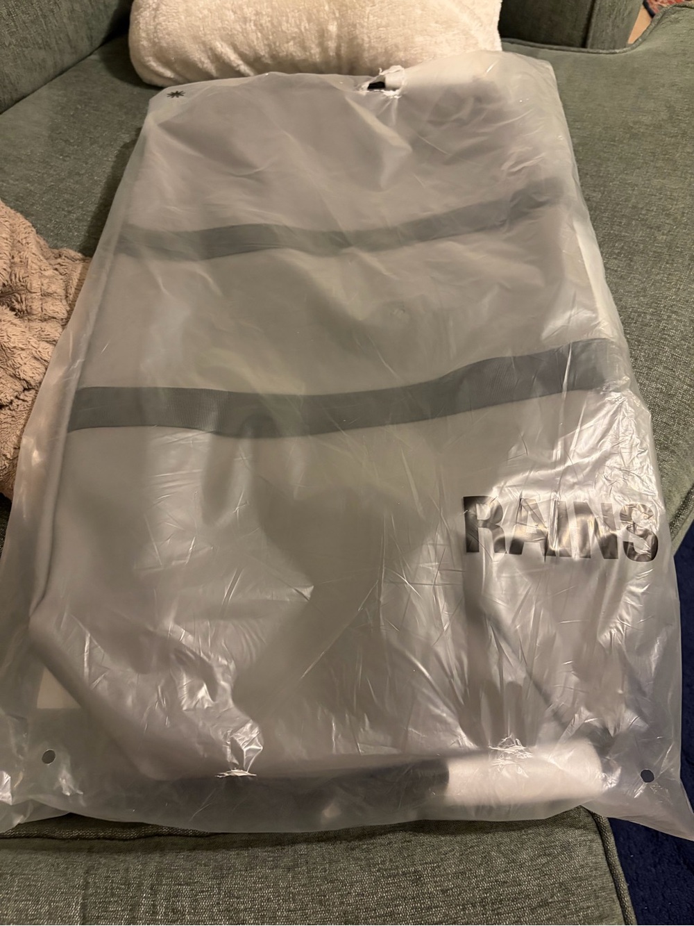 Rains gray waterproof pack cover with reflective stripes